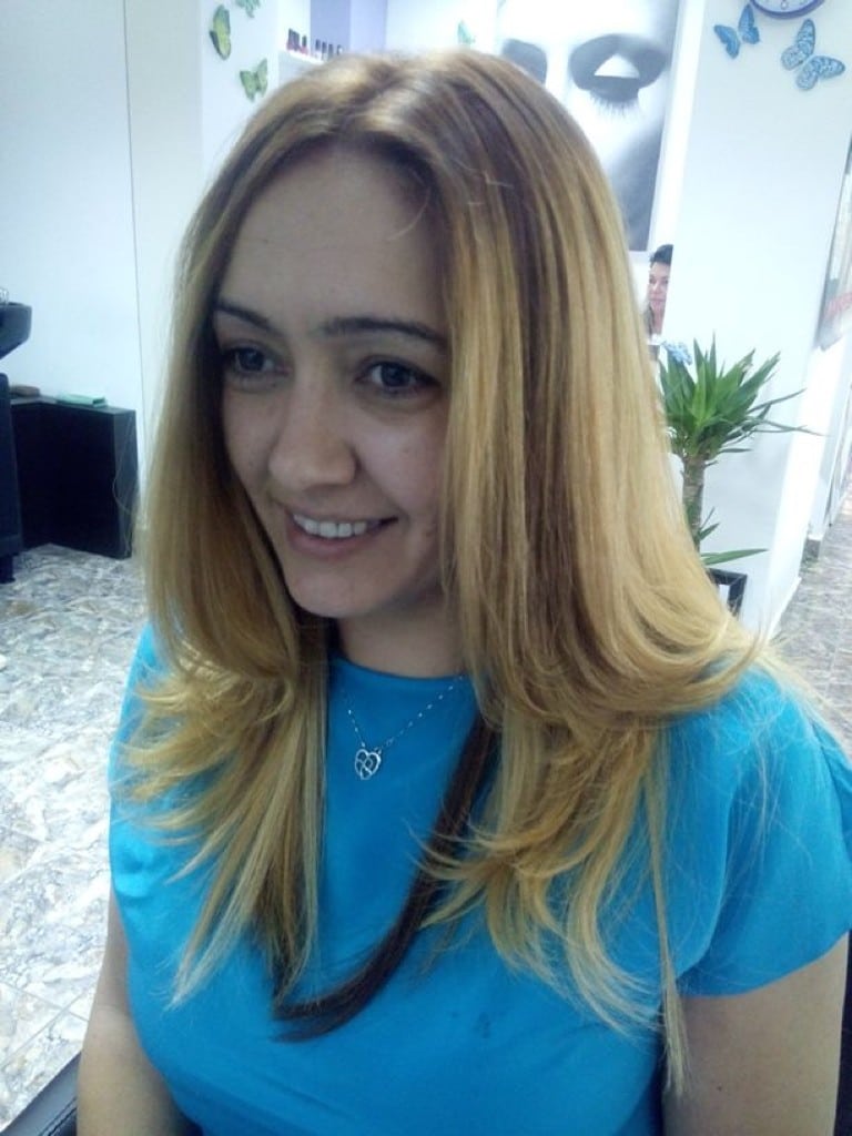 Girl with Blonde Straight Hair and Blue Top