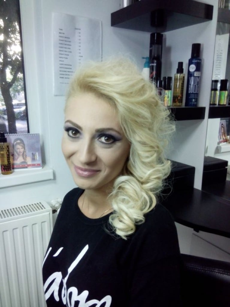 Girl with Blonde Hair and Black T-Shirt