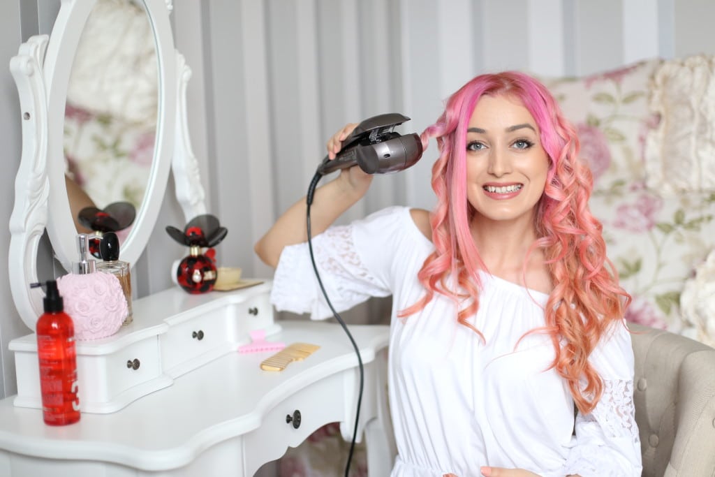 Styling with Babyliss hair curling machine