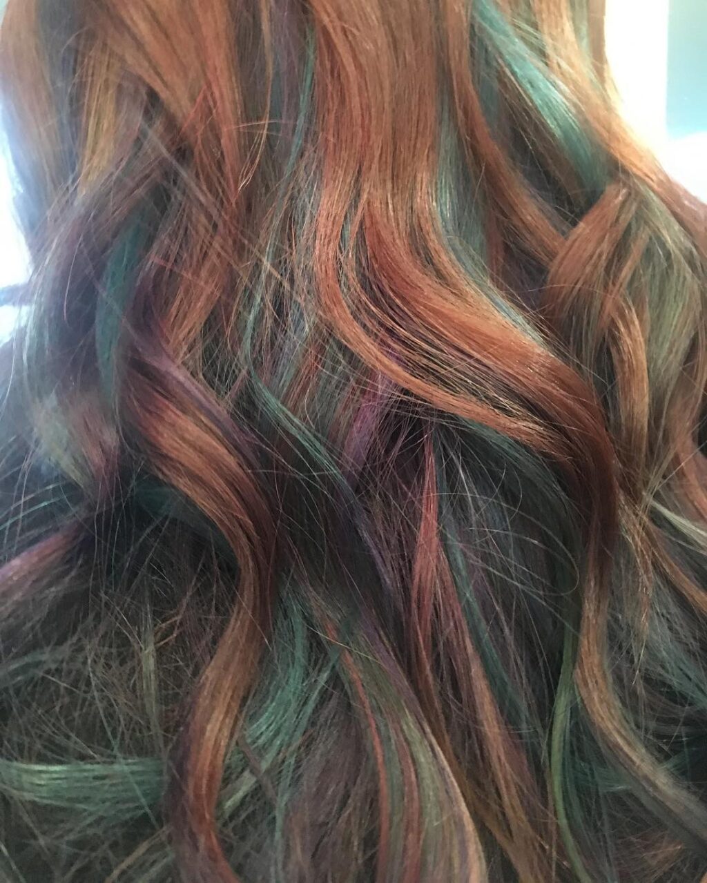 Oil slick hair redhead